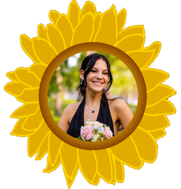 Abby Doherty smiling, framed by a sunflower